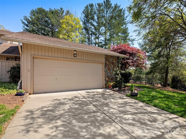 garage featuring driveway