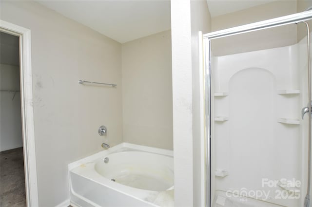 full bath with an enclosed shower and a bathing tub