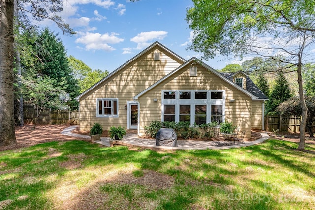 rear view of house with a patio area
