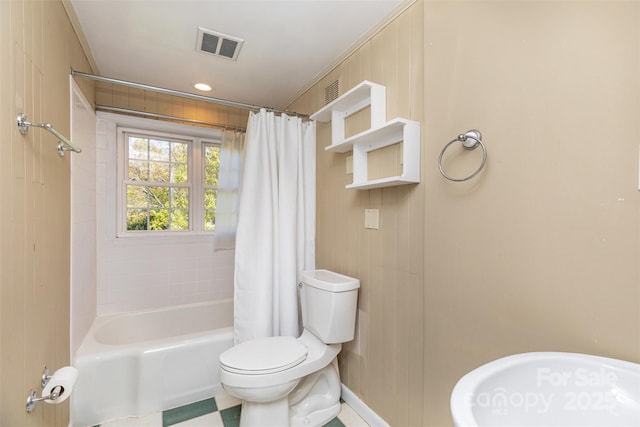 bathroom with toilet and shower / bath combination with curtain