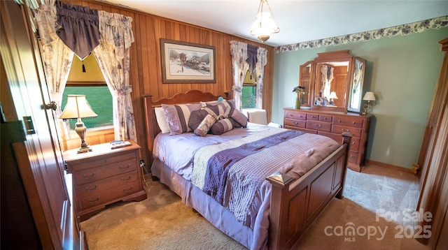 bedroom with light colored carpet
