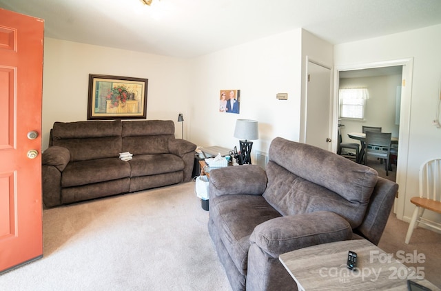 living area with carpet floors