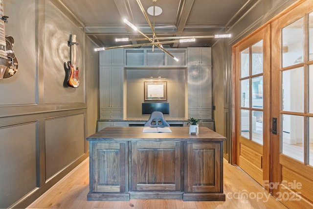office area featuring french doors, light wood-style flooring, beam ceiling, and coffered ceiling