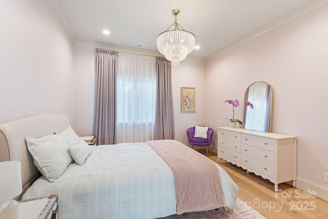 bedroom with light wood-style floors, a chandelier, recessed lighting, visible vents, and ornamental molding
