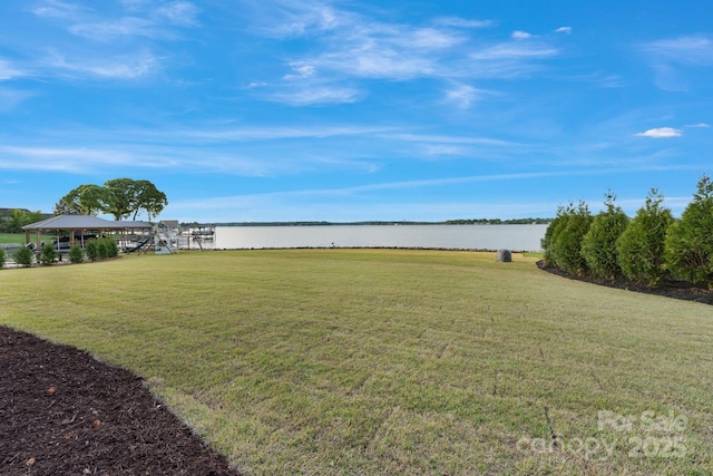 7679 Rabbit Cir, Denver, NC 28037 - view of grassy yard featuring a water view