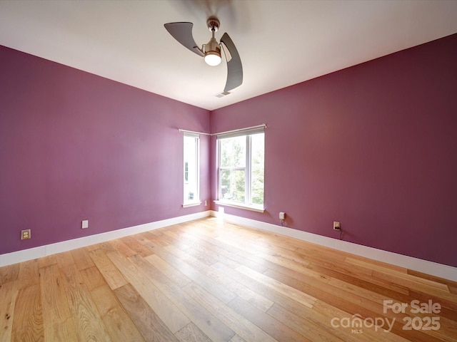 650 Raphael Pl, Charlotte, NC 28205 - unfurnished room with a ceiling fan, light wood finished floors, and baseboards