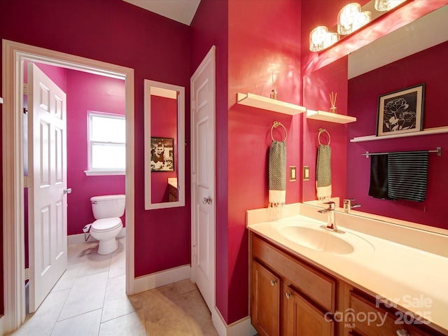 650 Raphael Pl, Charlotte, NC 28205 - bathroom with toilet, baseboards, vanity, and tile patterned flooring