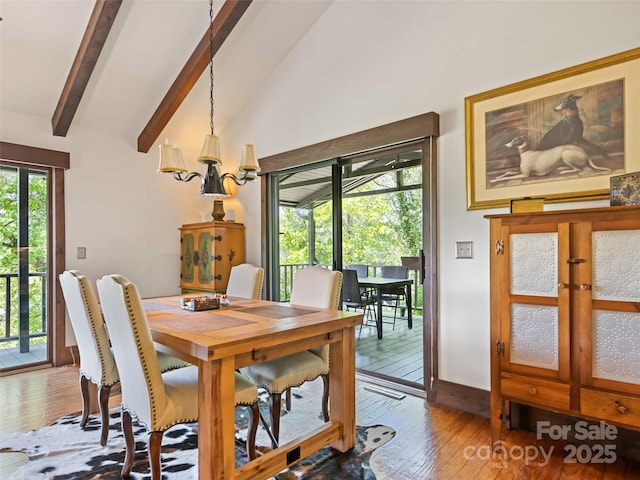 62 Cosmic Ln, Waynesville, NC 28786 - dining space featuring hardwood / wood-style floors and baseboards