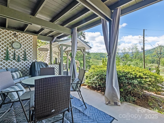 62 Cosmic Ln, Waynesville, NC 28786 - sunroom featuring outdoor dining space