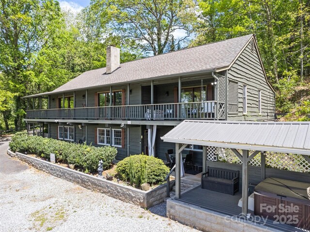 62 Cosmic Ln, Waynesville, NC 28786 - back of house with a chimney and a balcony