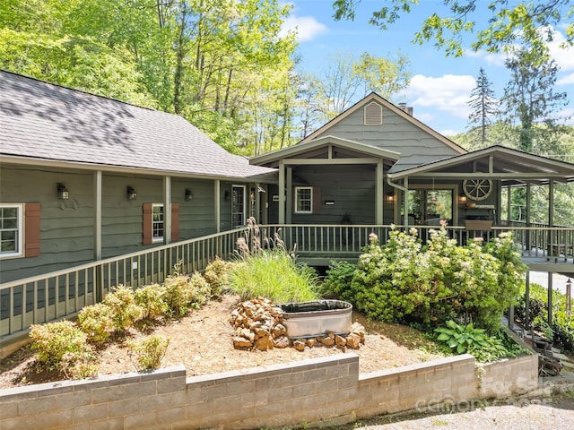 62 Cosmic Ln, Waynesville, NC 28786 - view of front of home featuring a deck and a shingled roof
