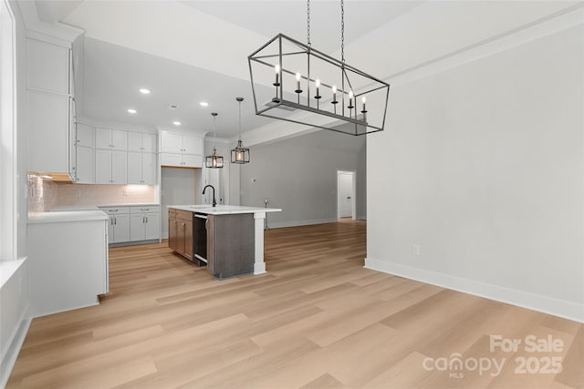 925 Twin Lakes Rd, Rock Hill, SC 29732 - kitchen with recessed lighting, open floor plan, a sink, an island with sink, and light wood-style flooring