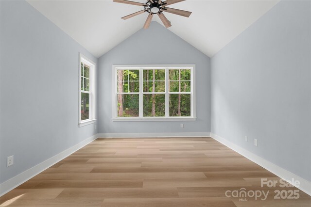 925 Twin Lakes Rd, Rock Hill, SC 29732 - empty room with ceiling fan, wood finished floors, baseboards, and lofted ceiling