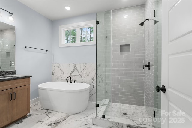 925 Twin Lakes Rd, Rock Hill, SC 29732 - bathroom with a stall shower, vanity, marble look tile flooring, a freestanding bath, and recessed lighting