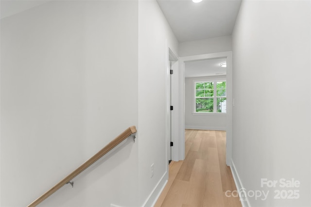 925 Twin Lakes Rd, Rock Hill, SC 29732 - hall featuring an upstairs landing, light wood finished floors, and baseboards