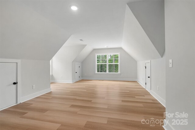 925 Twin Lakes Rd, Rock Hill, SC 29732 - additional living space featuring baseboards, light wood finished floors, vaulted ceiling, and recessed lighting