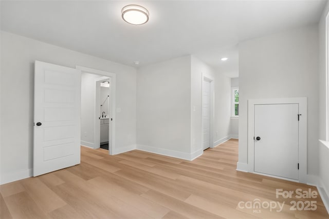 925 Twin Lakes Rd, Rock Hill, SC 29732 - spare room with light wood-type flooring, baseboards, and recessed lighting