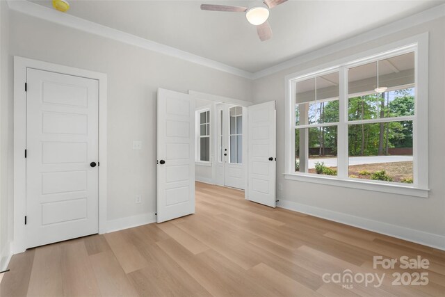 925 Twin Lakes Rd, Rock Hill, SC 29732 - unfurnished bedroom with light wood finished floors, baseboards, french doors, crown molding, and ceiling fan