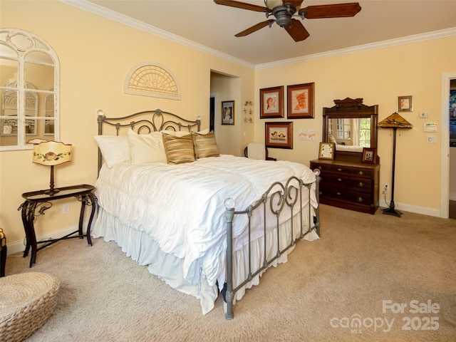 bedroom with baseboards, a ceiling fan, light colored carpet, and ornamental molding