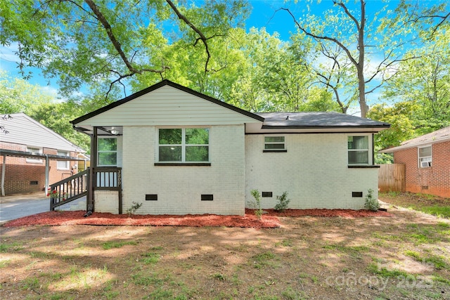 3300 Bonaire Dr, Charlotte, NC 28208 - back of property featuring crawl space and brick siding