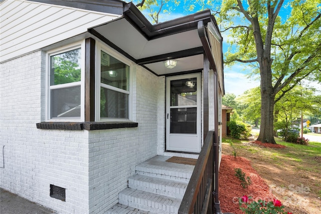 3300 Bonaire Dr, Charlotte, NC 28208 - entrance to property with brick siding and crawl space