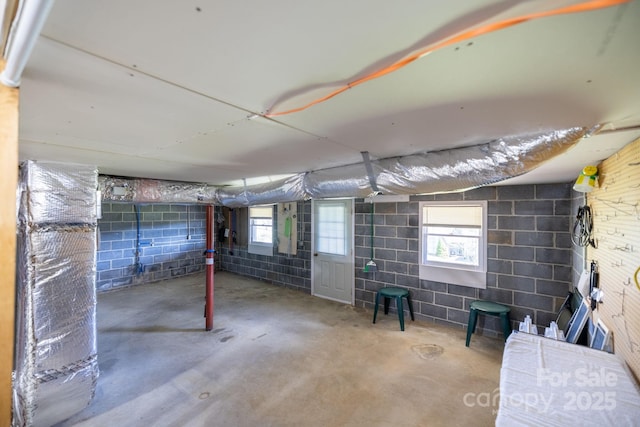 below grade area with concrete block wall