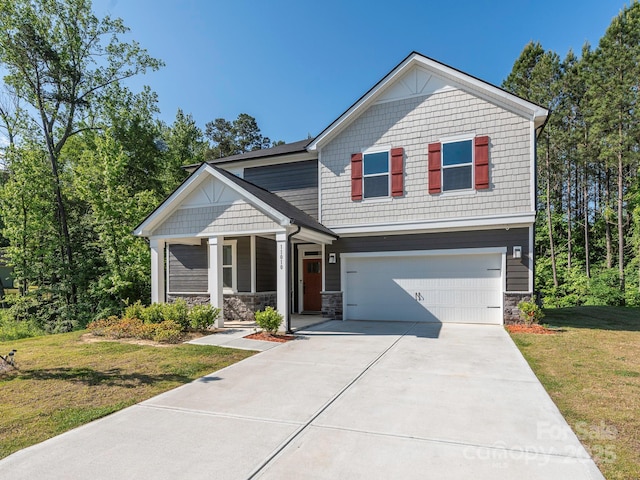 11010 Redcoat Hill Ln, Huntersville, NC 28078 - craftsman-style house with an attached garage, stone siding, a porch, and driveway