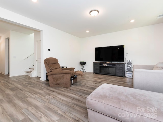 11010 Redcoat Hill Ln, Huntersville, NC 28078 - living area with wood finished floors, stairway, recessed lighting, and baseboards