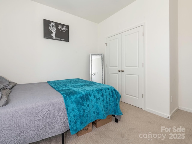 11010 Redcoat Hill Ln, Huntersville, NC 28078 - bedroom featuring carpet flooring, baseboards, and a closet