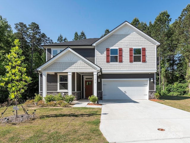 11010 Redcoat Hill Ln, Huntersville, NC 28078 - craftsman-style home with an attached garage, driveway, a front lawn, stone siding, and covered porch