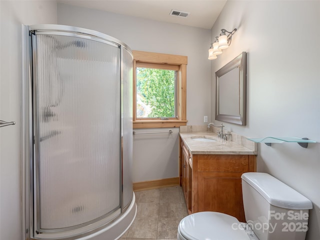 15 Sassy Ln, Asheville, NC 28805 - full bath with toilet, vanity, a shower stall, tile patterned floors, and baseboards