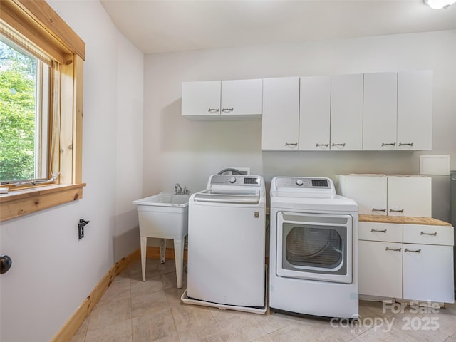 15 Sassy Ln, Asheville, NC 28805 - laundry room with cabinet space, washing machine and clothes dryer, and baseboards