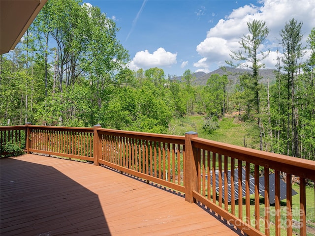 15 Sassy Ln, Asheville, NC 28805 - wooden deck featuring a wooded view