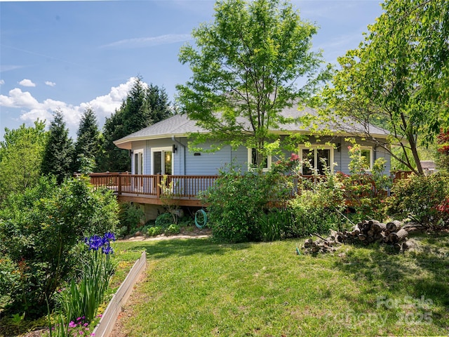 15 Sassy Ln, Asheville, NC 28805 - back of house featuring a deck, a lawn, and a shingled roof