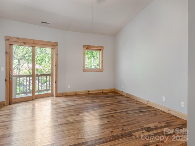15 Sassy Ln, Asheville, NC 28805 - unfurnished room with wood finished floors and baseboards