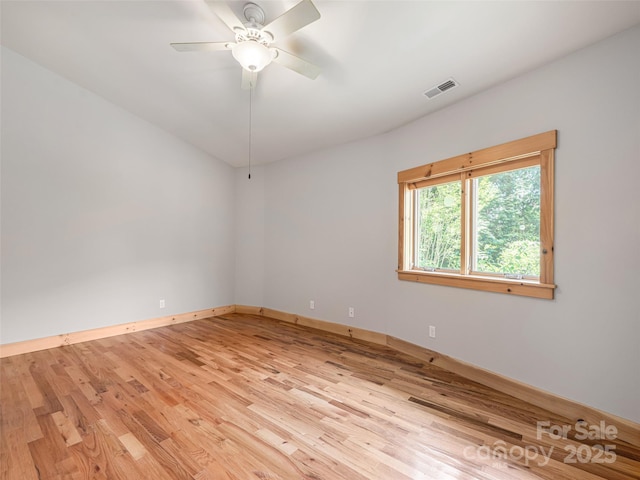 15 Sassy Ln, Asheville, NC 28805 - spare room with light wood-style floors, baseboards, and ceiling fan