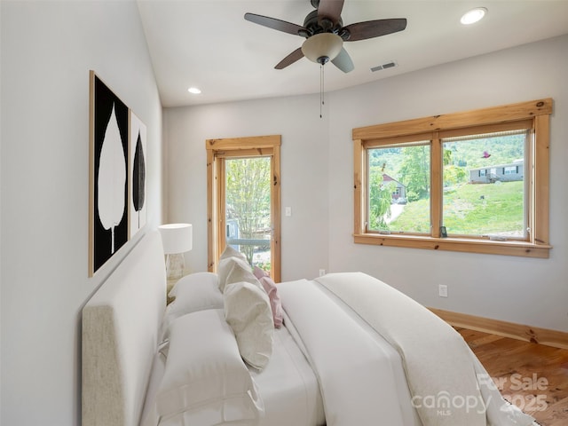 15 Sassy Ln, Asheville, NC 28805 - bedroom with recessed lighting, wood finished floors, baseboards, access to outside, and ceiling fan