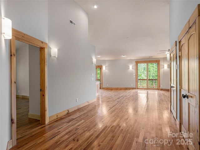 15 Sassy Ln, Asheville, NC 28805 - unfurnished room featuring light wood-style floors, baseboards, and a ceiling fan