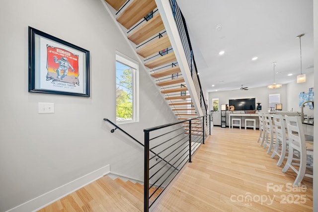 1115 Greenleaf Ave Unit B, Charlotte, NC 28202 - stairs featuring baseboards, recessed lighting, and wood finished floors
