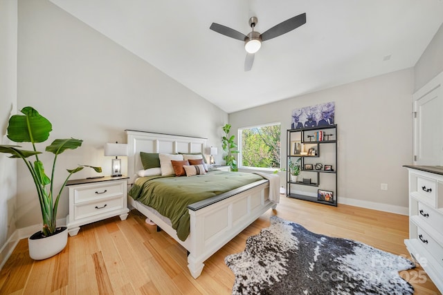 1115 Greenleaf Ave Unit B, Charlotte, NC 28202 - bedroom with a ceiling fan, baseboards, high vaulted ceiling, and light wood-style floors