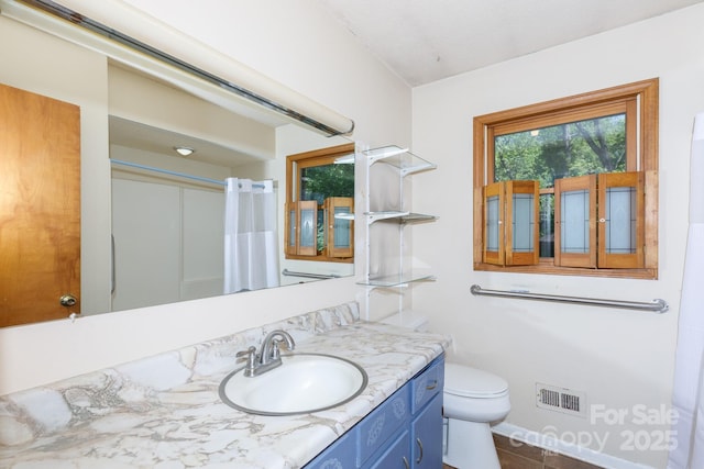 567 Willie Ln, York, SC 29745 - bathroom with tile patterned floors, visible vents, toilet, vanity, and a shower with shower curtain
