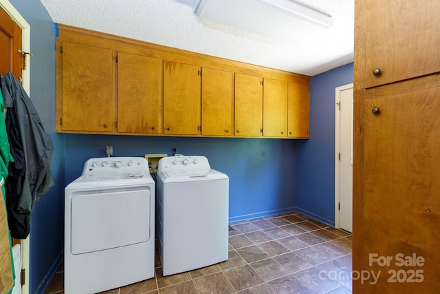 567 Willie Ln, York, SC 29745 - clothes washing area with baseboards, cabinet space, dark tile patterned floors, and independent washer and dryer