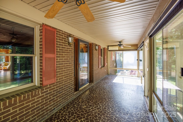 567 Willie Ln, York, SC 29745 - unfurnished sunroom featuring a ceiling fan and a wall unit AC