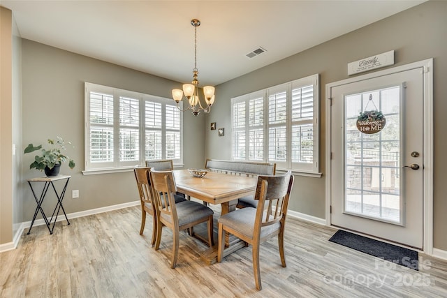 4083 Home Grown Way, Clover, SC 29710 - dining room featuring light wood-type flooring, baseboards, visible vents, and a notable chandelier