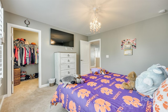 4083 Home Grown Way, Clover, SC 29710 - bedroom with light carpet, baseboards, a notable chandelier, a closet, and a walk in closet