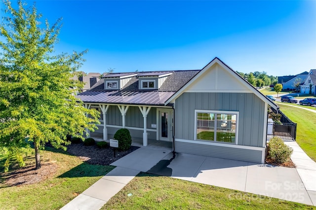 4083 Home Grown Way, Clover, SC 29710 - view of front of property with board and batten siding and a front yard