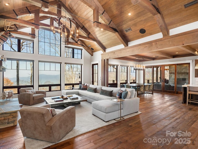 61 Back Bone Way Unit 203, Sylva, NC 28779 - living area featuring beam ceiling, a chandelier, visible vents, and wood ceiling