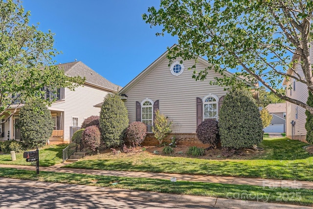 3939 Archer Notch Ln, Huntersville, NC 28078 - view of front facade featuring brick siding and a front yard