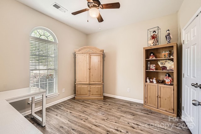 3939 Archer Notch Ln, Huntersville, NC 28078 - office featuring light wood-type flooring, a ceiling fan, and baseboards