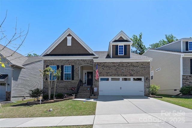 2333 Talon Point Cir, Fort Mill, SC 29715 - view of front facade with brick siding, concrete driveway, a front yard, and an attached garage